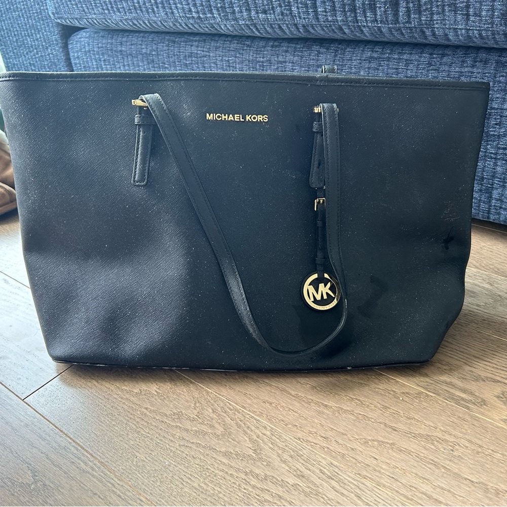 Michael Kors black saffiano leather handbag with laptop sleeve